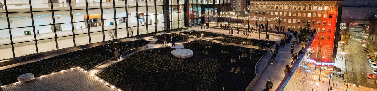 Overhead image of the Garden Terrace at Summit lit up at night.